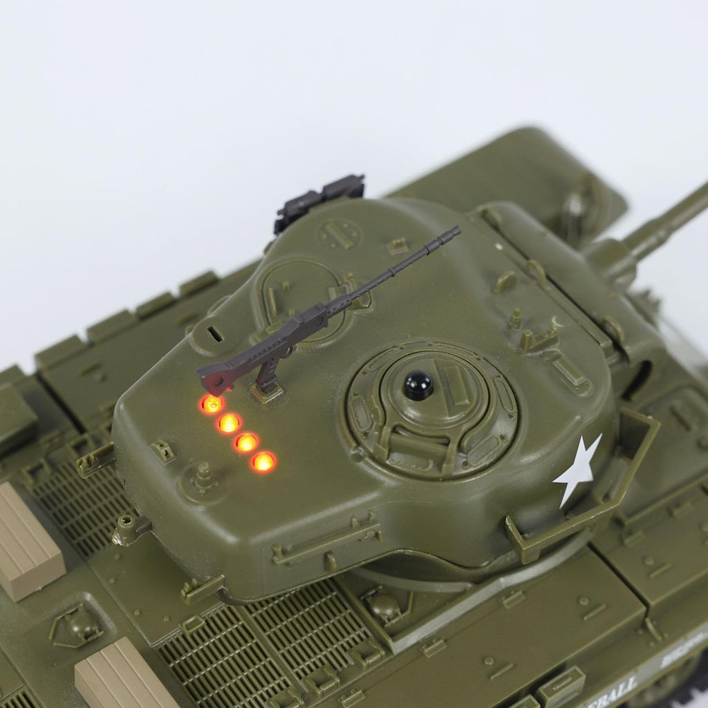 Close-up of a green military tank model with visible details on a white background