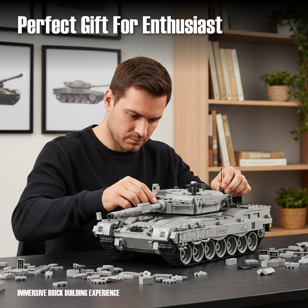 Man assembling a large model tank made of building blocks in a room with shelves and framed pictures.